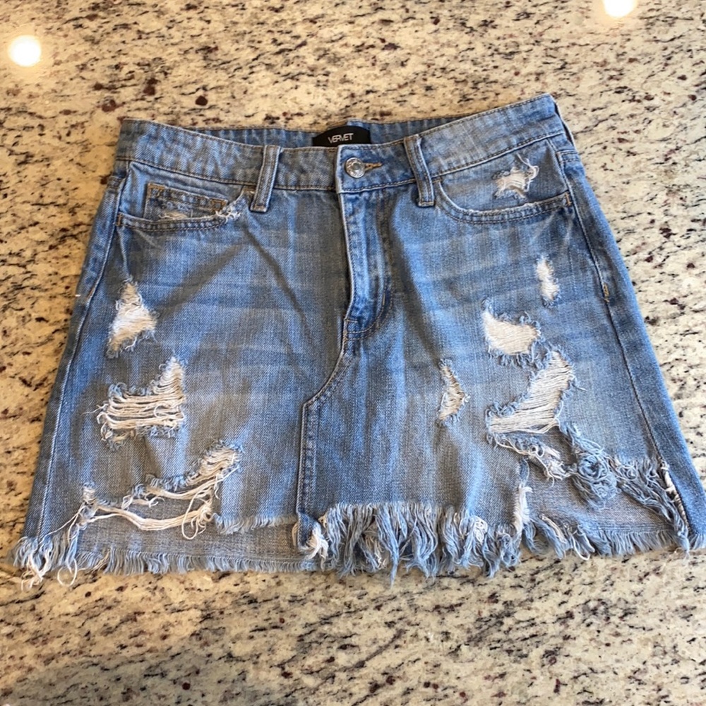 High-rise distressed mini skirt